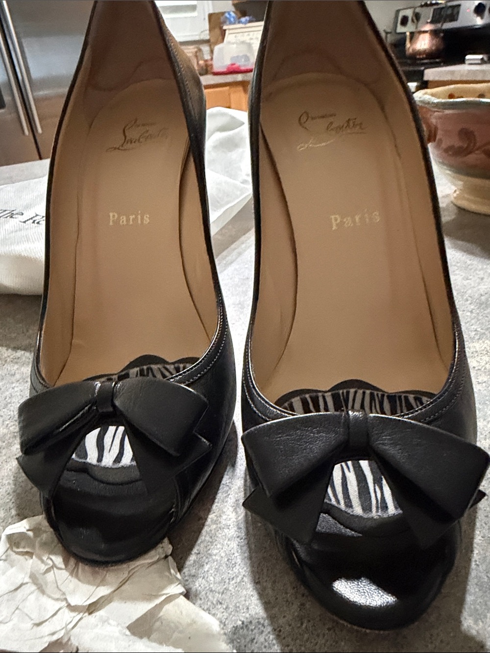 Christian Louboutin Black Peep-Toe Leather Pumps with Bow Accent.